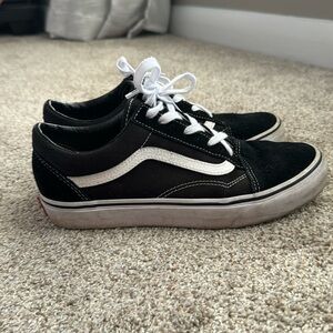 Black low top Vans